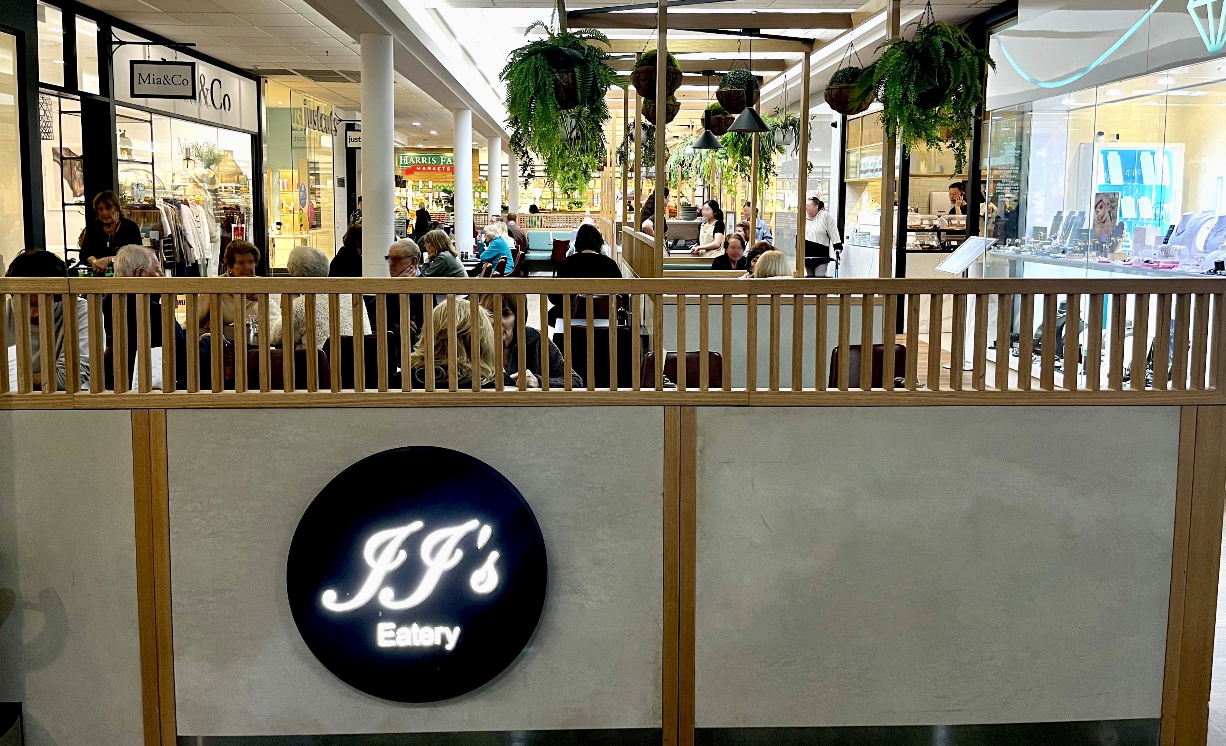 Guests enjoying the lush JJ's Eatery dining area in St Ives Shopping Village